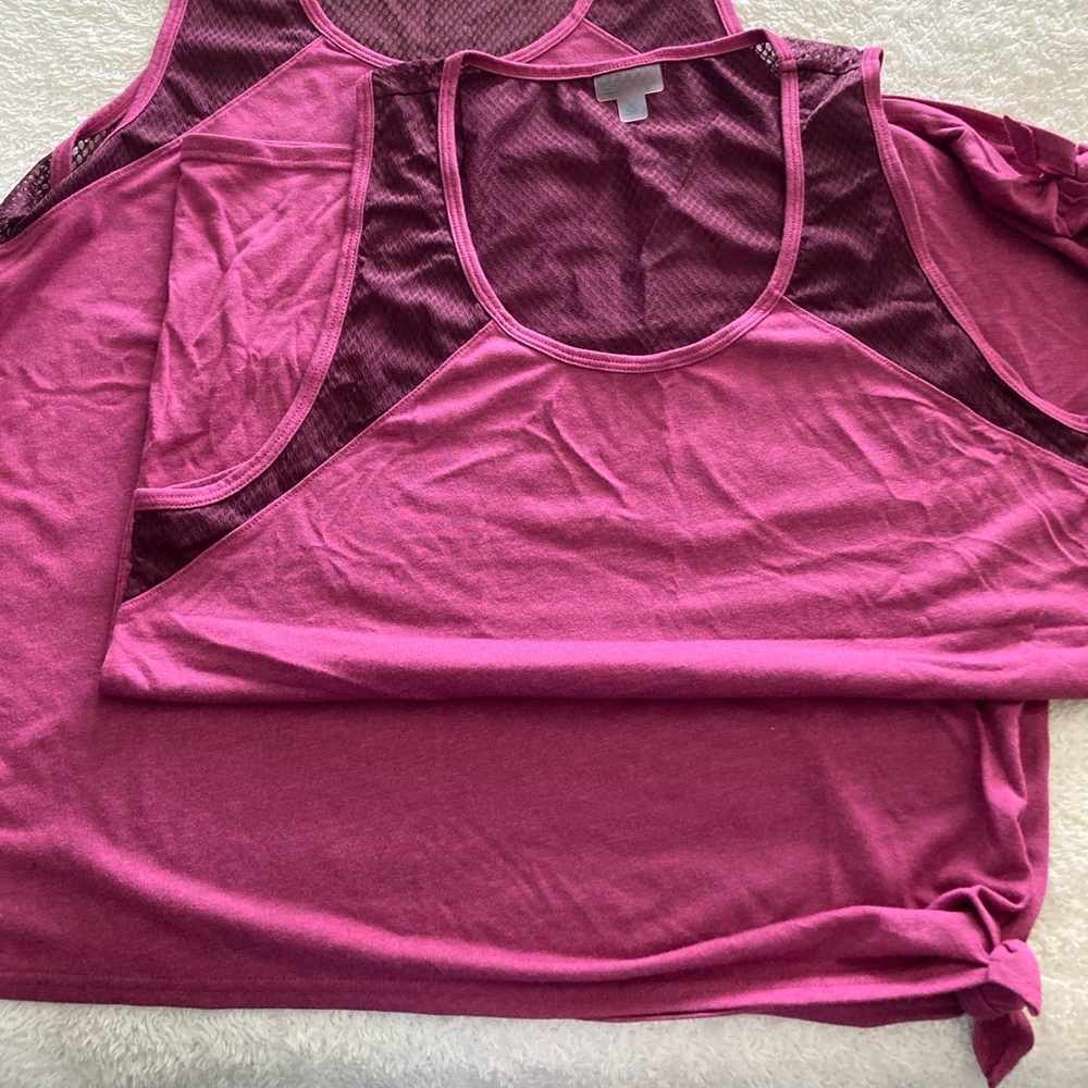 NEW!  Two Sketchers exercise tees. Washed once but never worn. Too small for me.